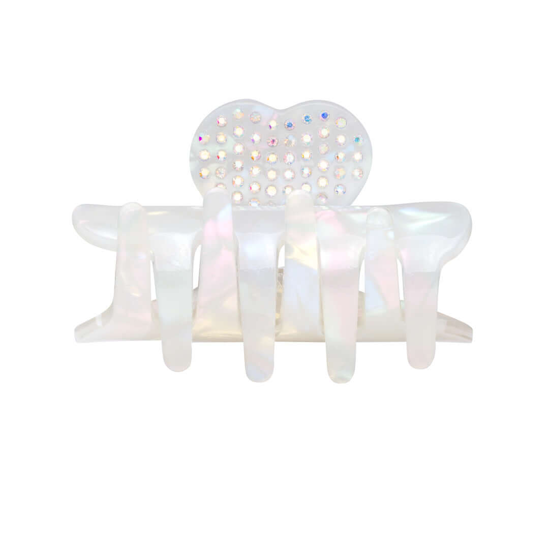 Small RIKI Hair Clip in iridescent marble, designed with crystal hearts and an interlocking claw closure for thin hair.