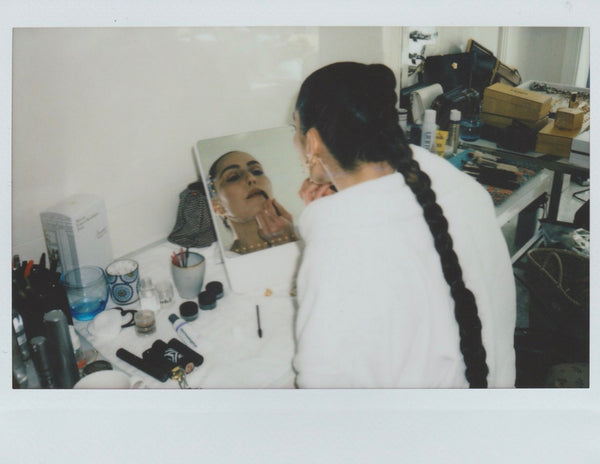 Actress Noomi Rapace getting ready for the Cannes Film Festival using a RIKI SKINNY LED vanity mirror.