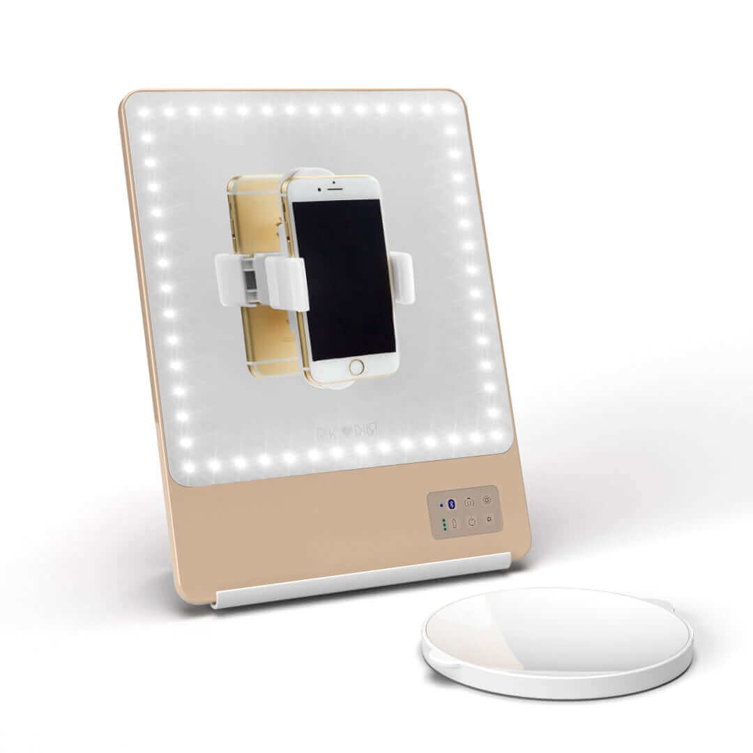 Champagne gold RIKI SKINNY mirror with 10x magnification, elegant and slightly used, sample sale.