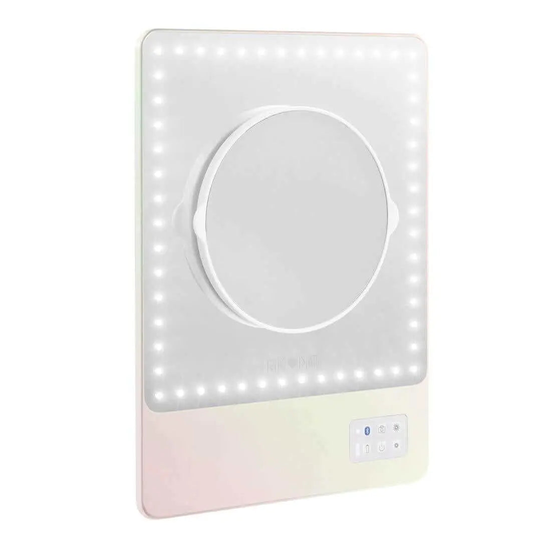 Iridescent RIKI SKINNY mirror with 10x magnification, front view, repackaged for sample sale.