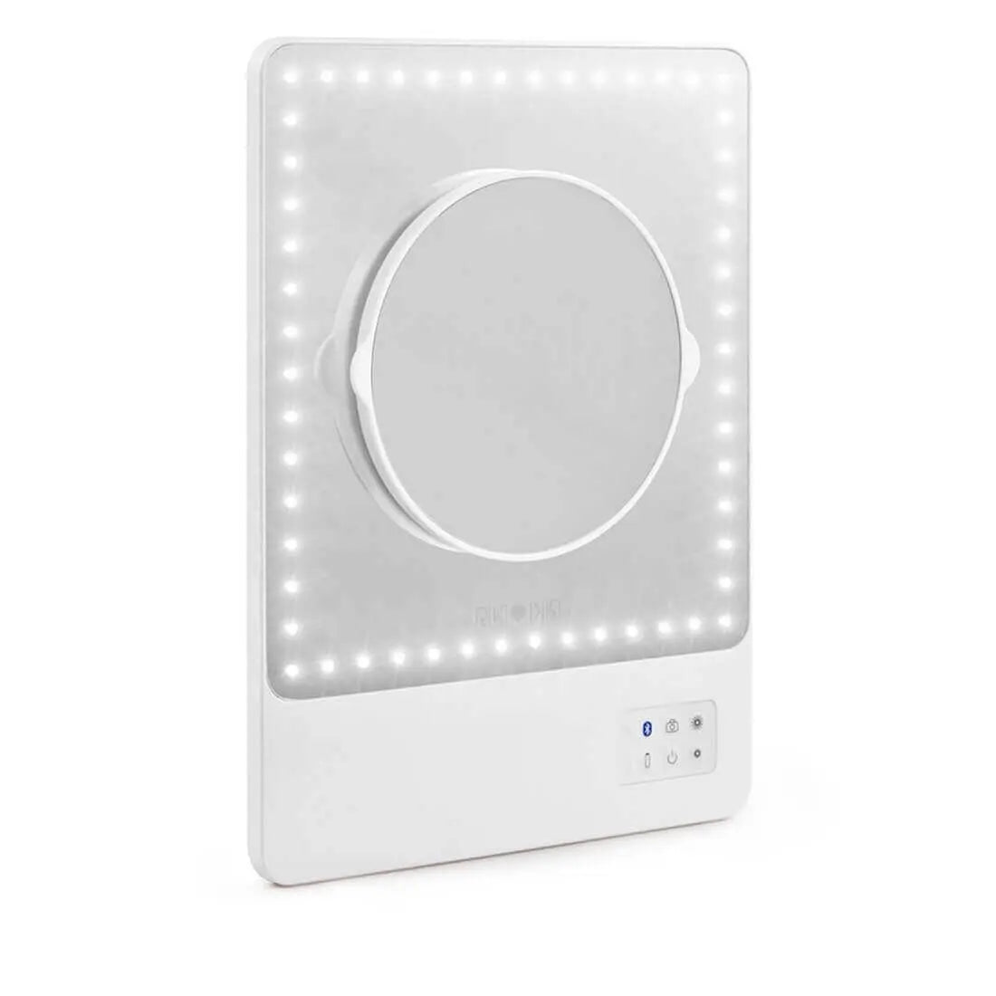 Pristine white RIKI SKINNY mirror with 10x magnification, front view, sample sale.