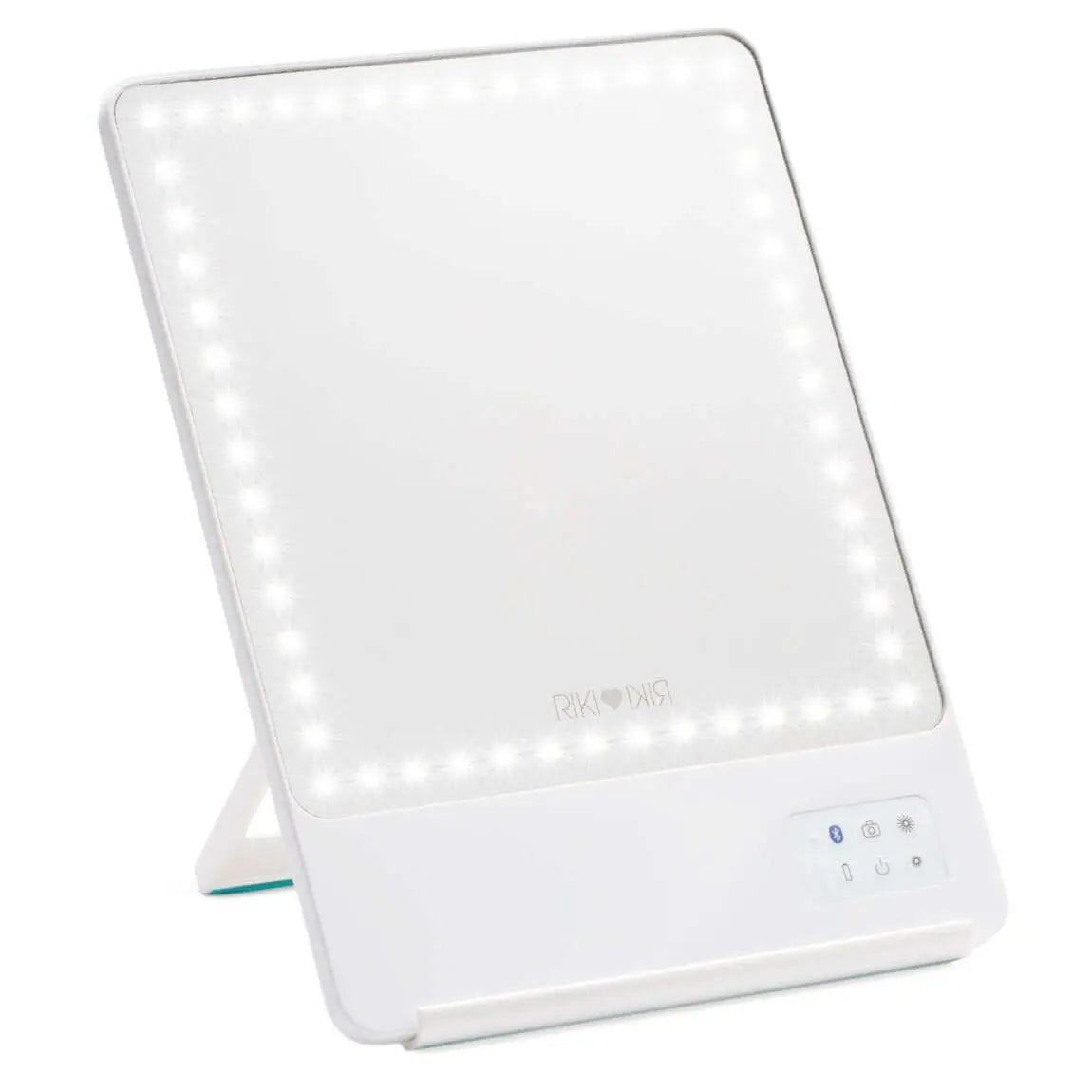 Pristine white RIKI SKINNY mirror with 10x magnification, front view, sample sale.