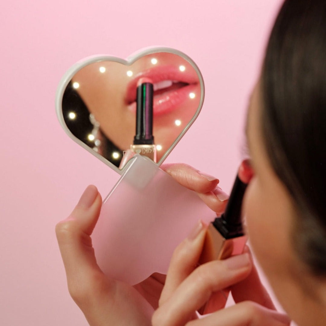 White RIKI Sweetheart Beauty Essential selfie light attachable to your phone for easy use.