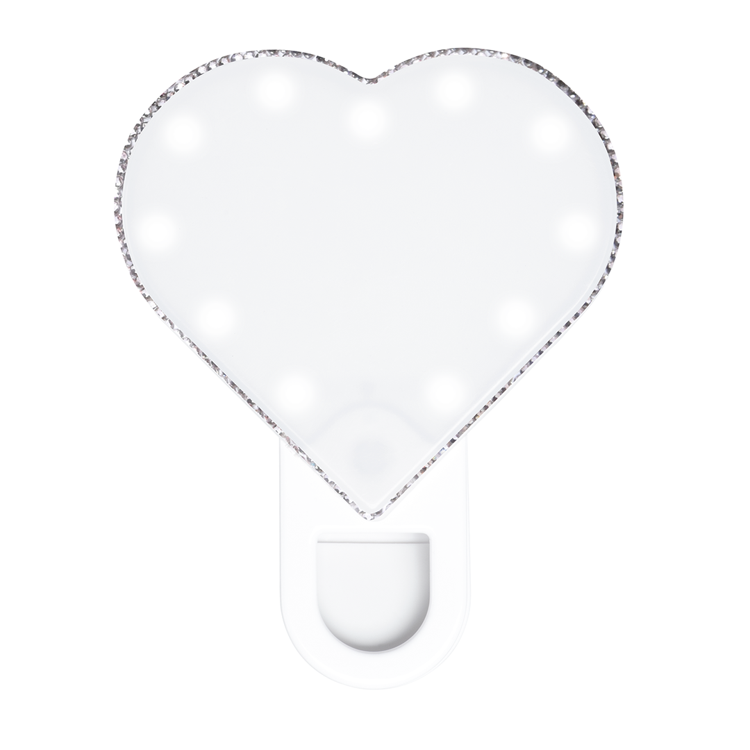 RIKI Sweetheart Beauty Essential selfie light easily attachable to your phone for on-the-go lighting.