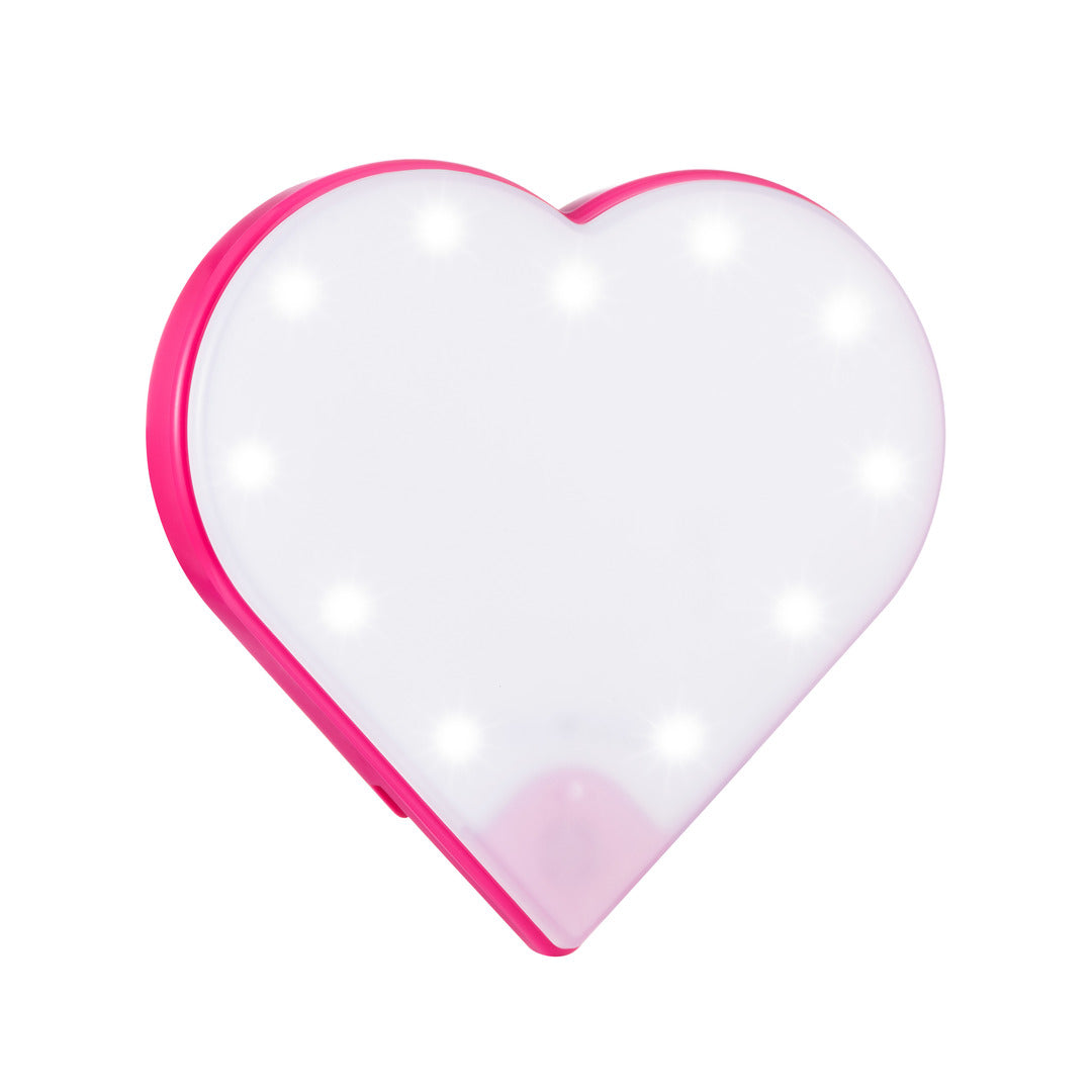 Pink RIKI Sweetheart Beauty Essential for a stylish and functional selfie light and mirror.