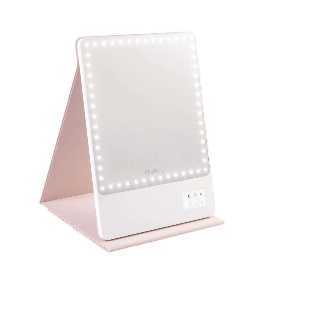 Portable pink Riki Loves Riki Skinny Flip Case for seamless makeup on the go, perfect for traveling