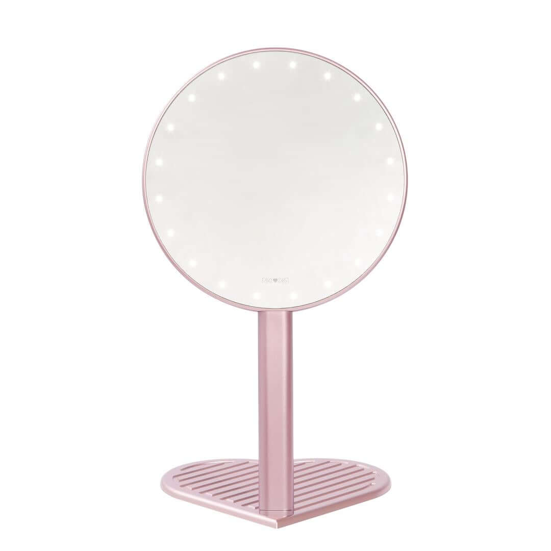 The RIKI GRACEFUL handheld face mirror with 7X magnification, LED lights, and a charming heart-shaped base.