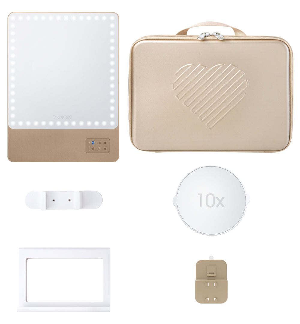 Make your travel beauty effortless with the RIKI Babe Travel Set in Champagne Gold. This set includes the RIKI SKINNY mirror and a 10x magnifying attachment for close-up perfection anywhere!