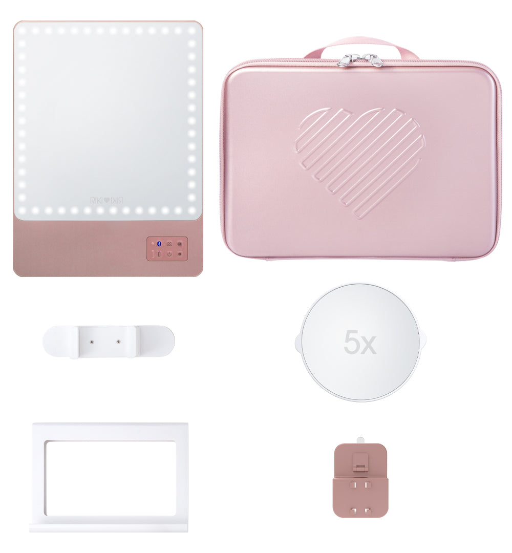 Upgrade your travel beauty routine with the RIKI Babe Travel Set in Rose Gold. Featuring the RIKI SKINNY with daylight LED lighting and a 5x magnifying mirror, this bundle is perfect for flawless makeup application anywhere you go!