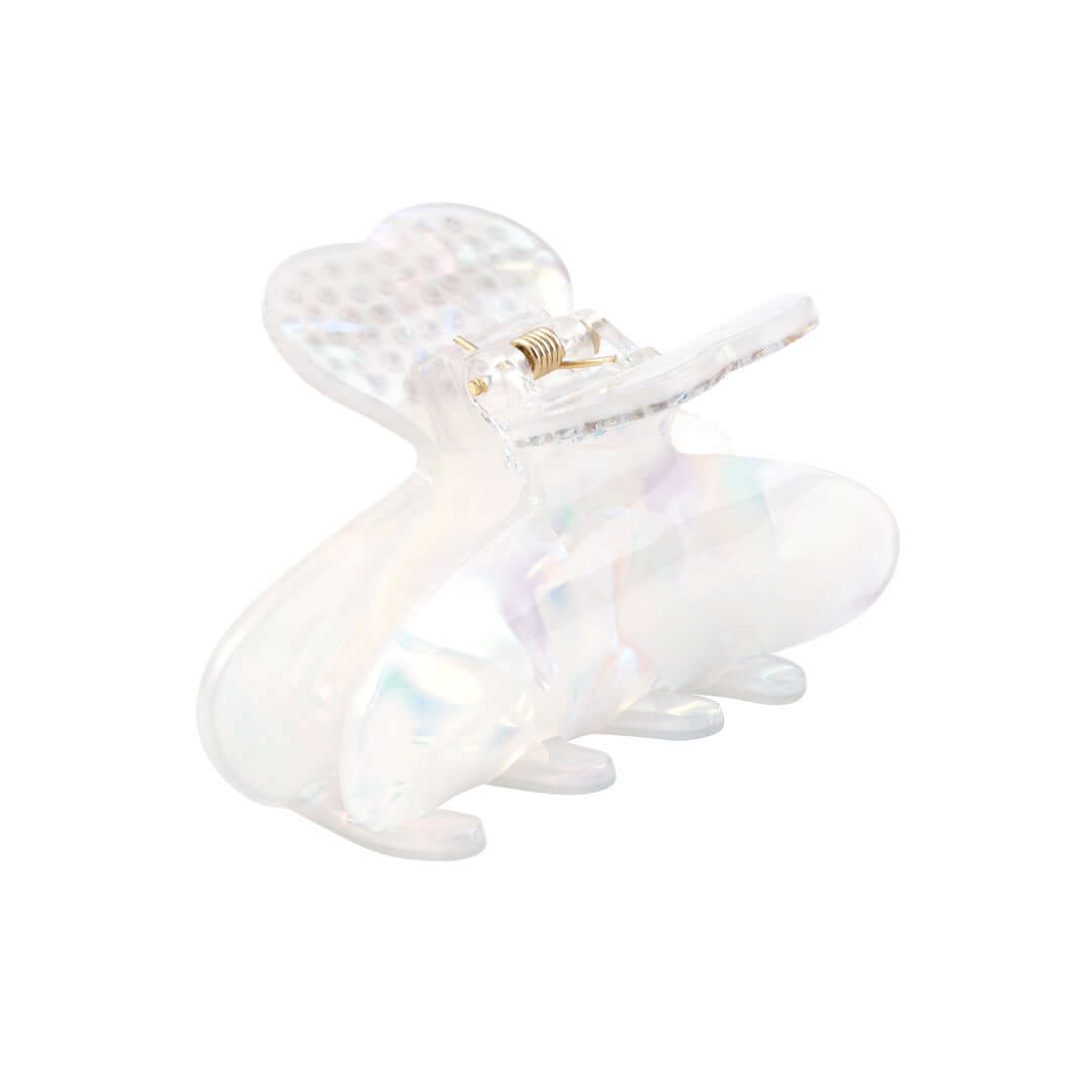 White RIKI Hair Clip with crystal hearts, perfect for a quick and glamorous hair look.