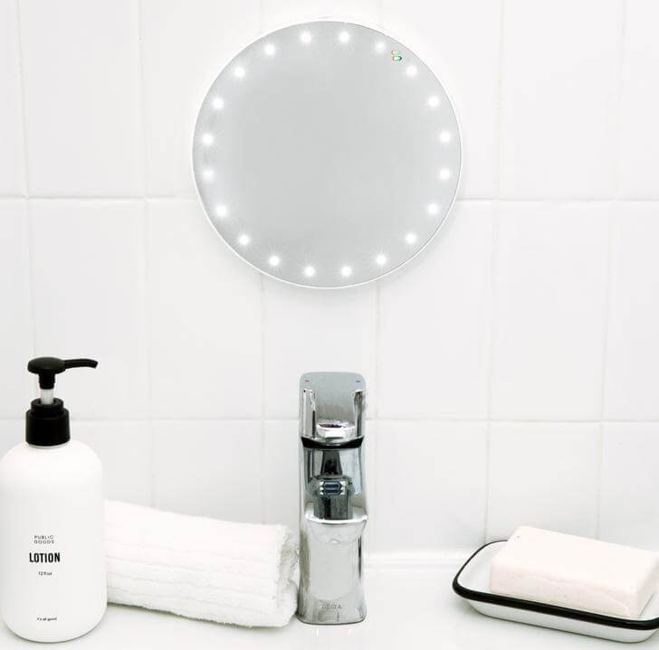 The GLAMCOR Home Shaving Mirror with shatter-proof glass and magnetic mounting.