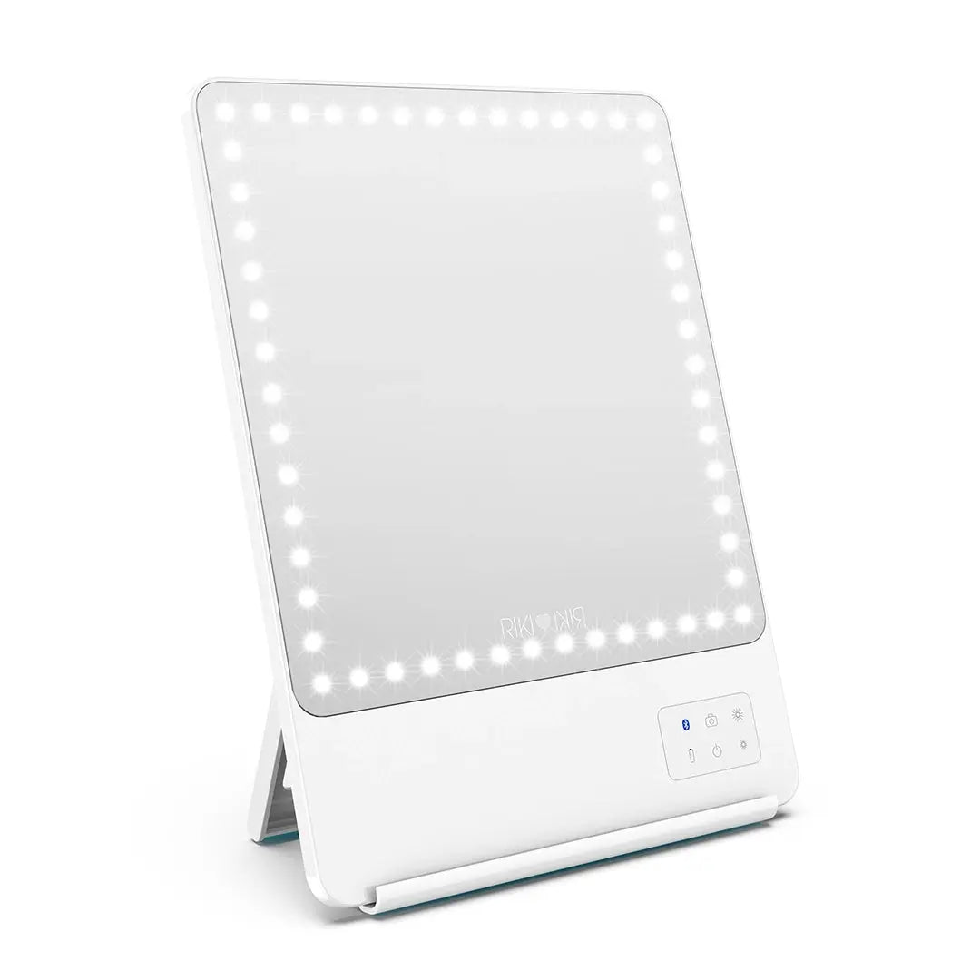 White RIKI SKINNY portable LED makeup mirror on its stand