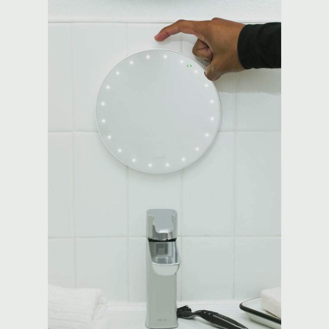 Shaving mirror with adjustable LED lights and fogless technology by GLAMCOR Home.