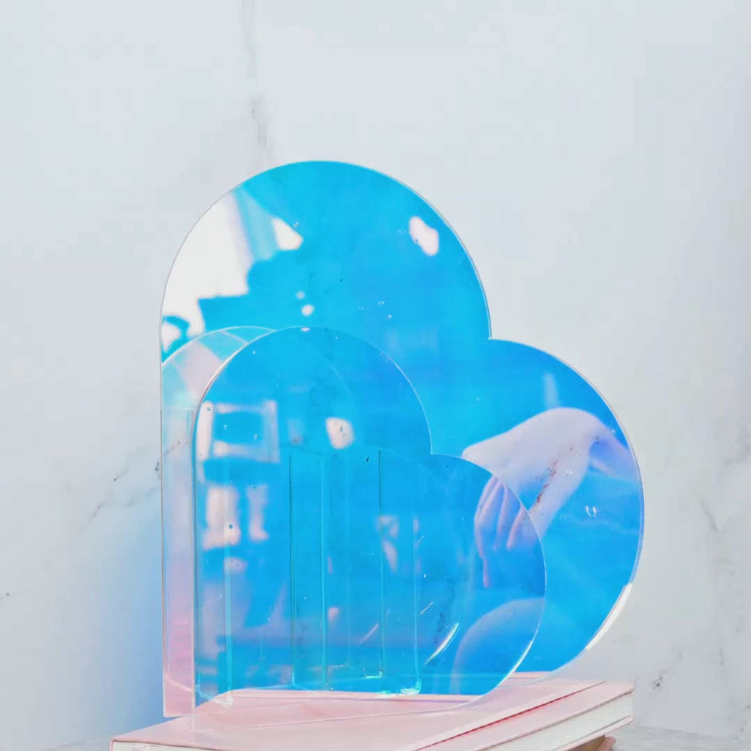 Iridescent heart-shaped RIKI VASE, ideal for adding a pop of color and style while organizing vanity essentials