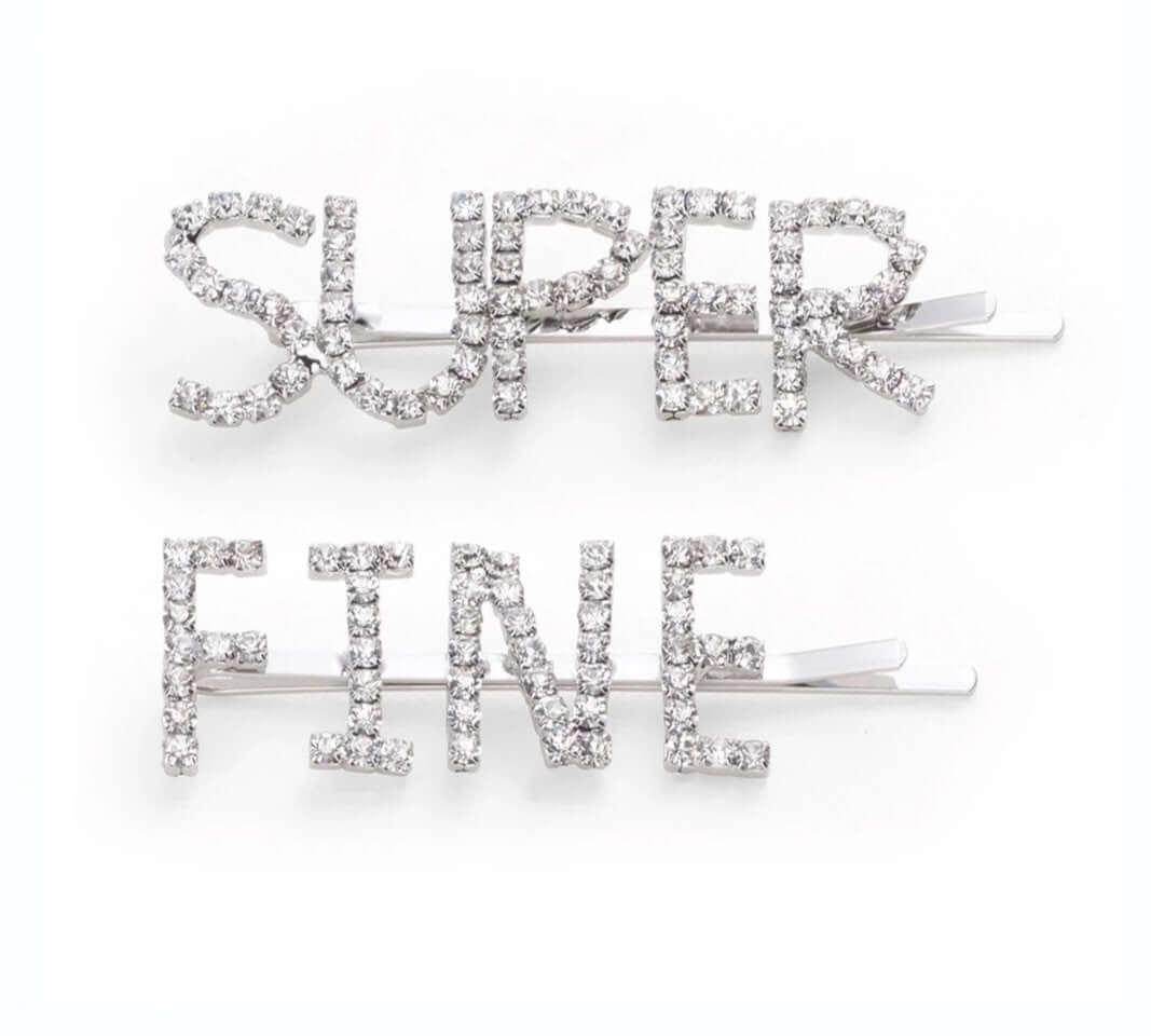 Elevate your style with the RIKI LOVES RIKI Super Fine Hair Clip adorned with sparkling white crystals.