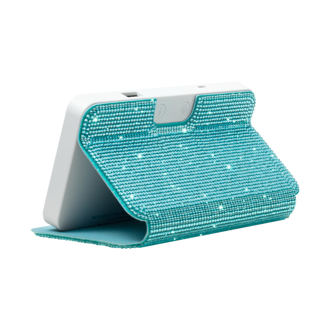Sparkle RIKI Powerful LED-lighted mirror and power bank in blue by RIKI LOVES RIKI, adding a pop of color to your beauty routine.
