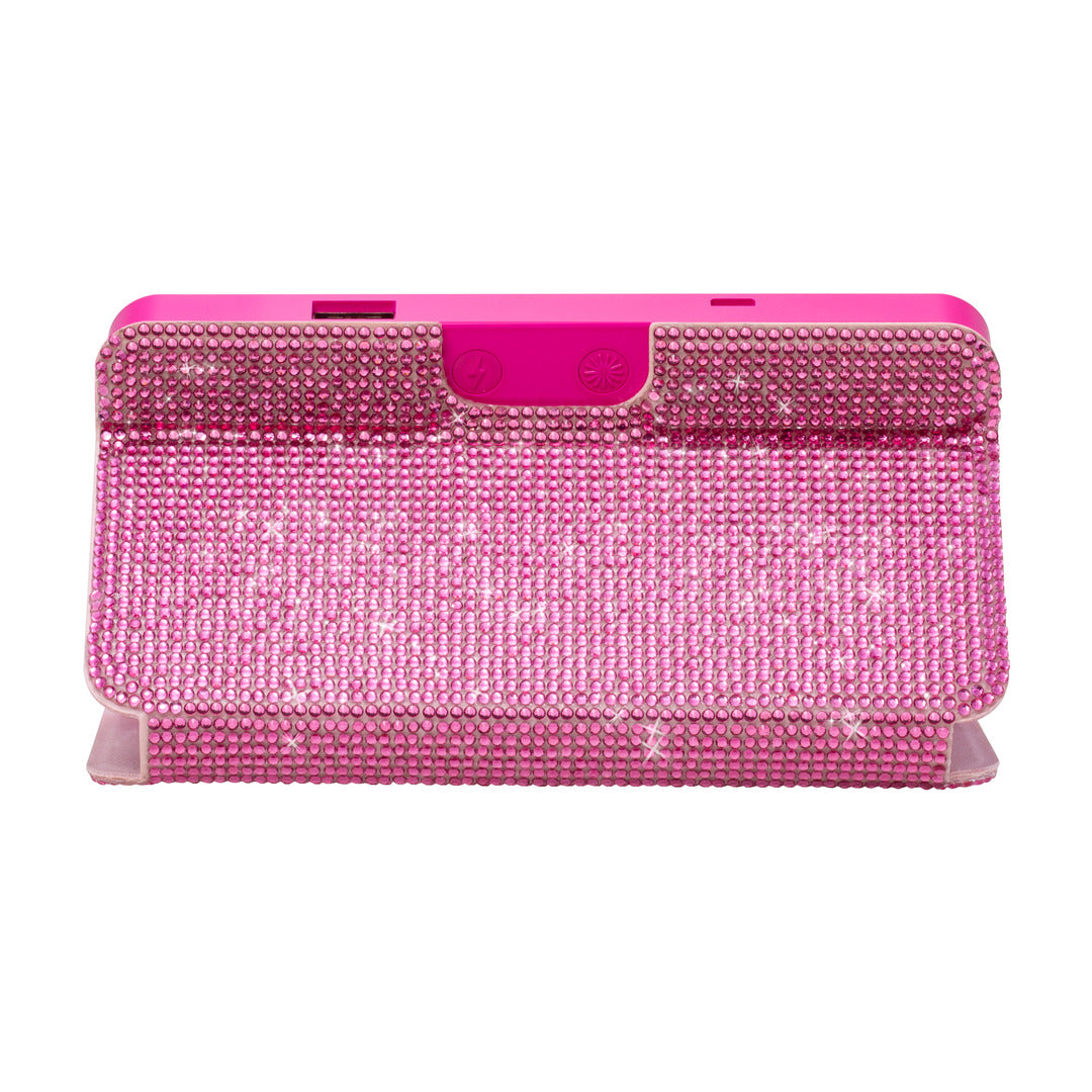 Back view of the Sparkle RIKI Powerful LED-lighted mirror and power bank in hot pink by RIKI LOVES RIKI, with a handheld mirror and portable cell phone charger.