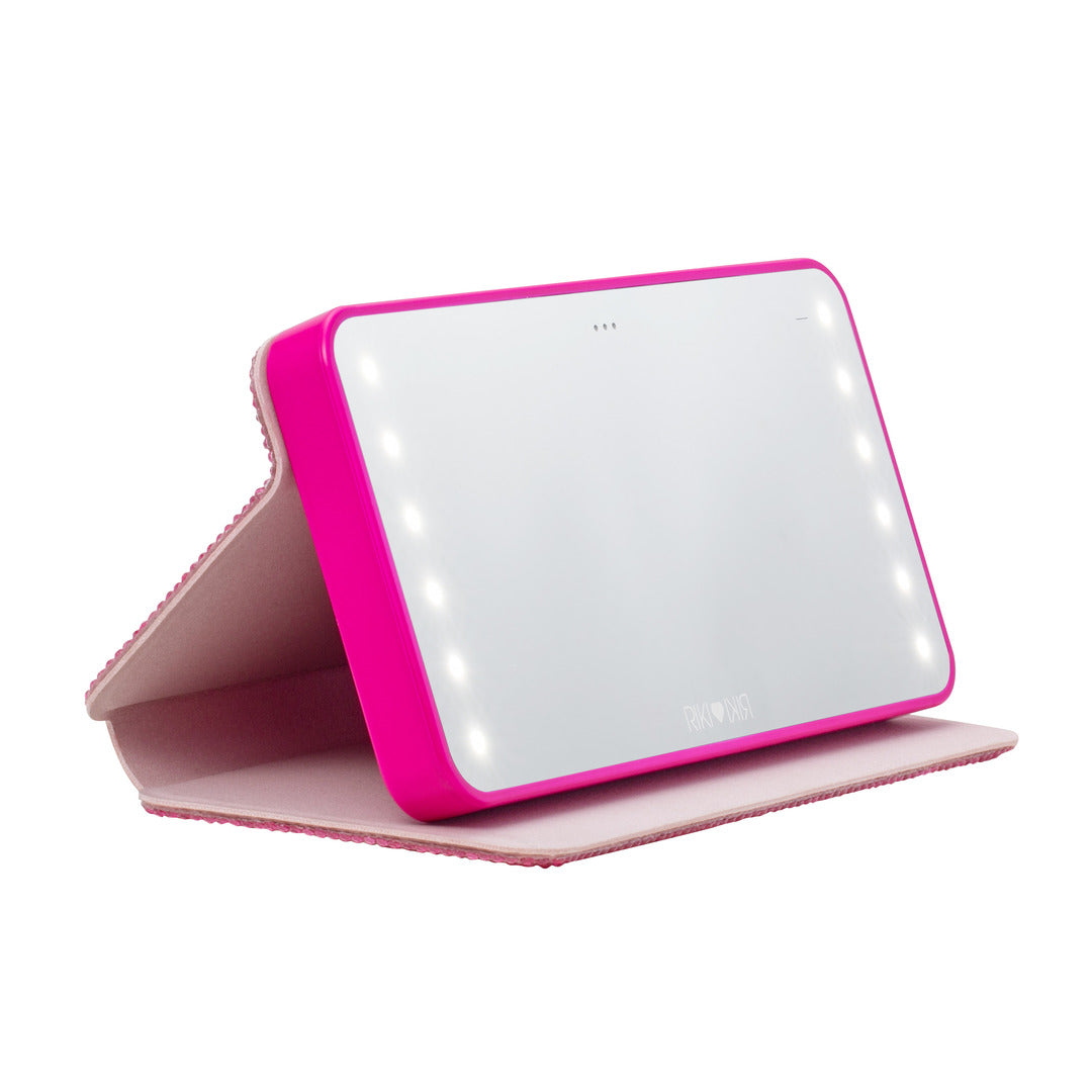 Protective cover for the hot pink Sparkle RIKI Powerful LED-lighted mirror and power bank by RIKI LOVES RIKI, ensuring your mirror stays pristine while also serving as a portable phone charger.