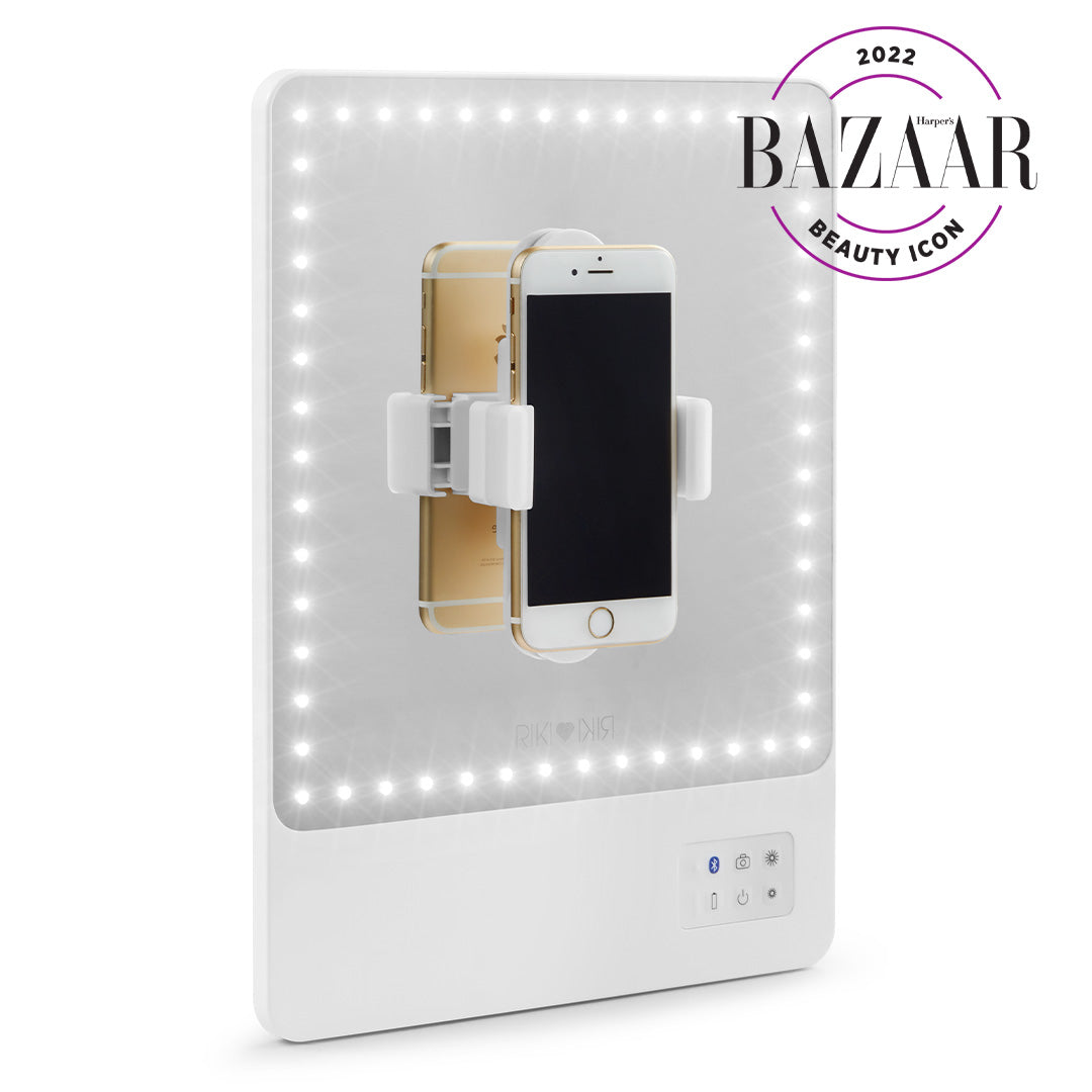 RIKI Skinny White Makeup Mirror, top-rated portable LED vanity mirror with phone holder, Bluetooth capability, 5 dimming stages and cool light - the ideal gift for beauty enthusiasts.